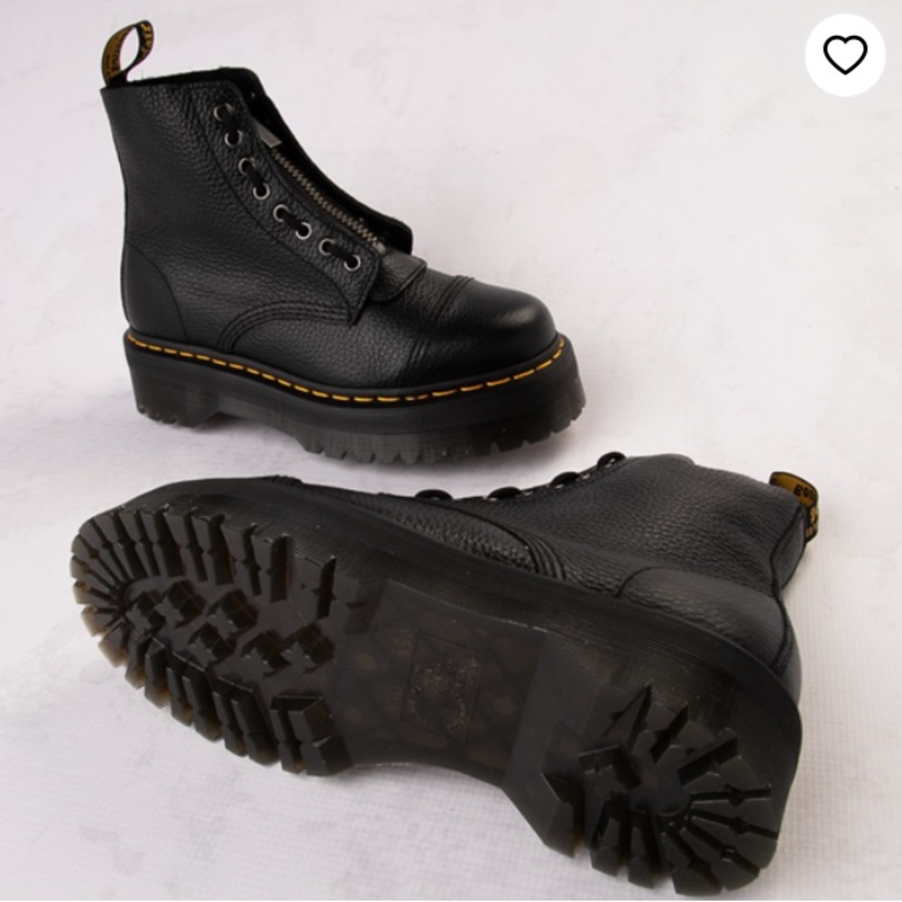 Dr. Martens rocks a unique design with the option of lacing up or zipping up.